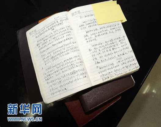 這是稅成康留下的日記本，上面瑣碎地、流水賬般地記錄了他的工作事務和生活感悟（10月12日攝）。